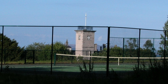 Tower behind tennis courts