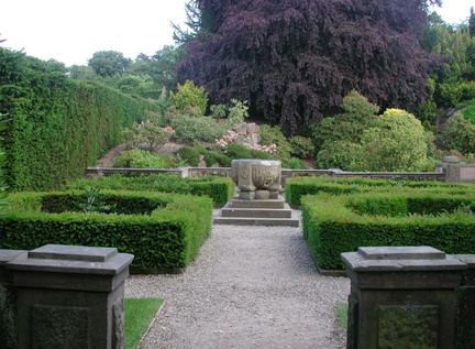 Fountain surrounded by hedges