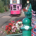 Pink tram in station