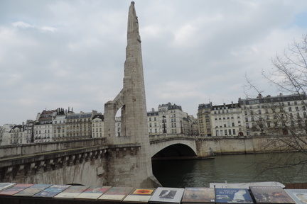 Obelisk behind books
