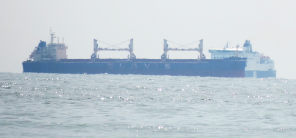 Ship passing ferry