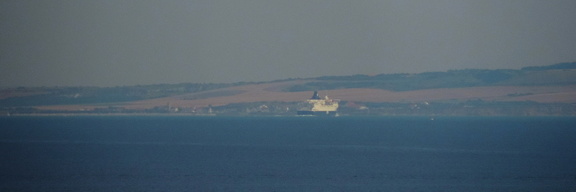 Ferry against the coast