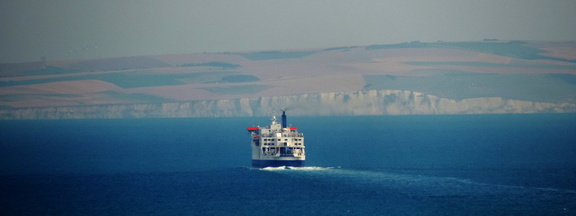 Ferry against the coast