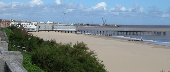Beach, piers and turbine