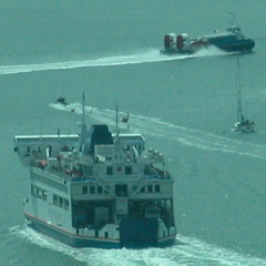 Hovercraft passing in front of Ferry