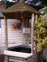 Well at the entrance to the miniature village