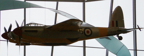 Silver and yellow plane
