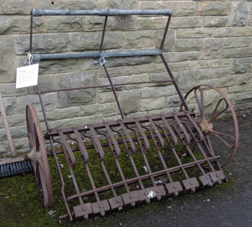 Road scraper