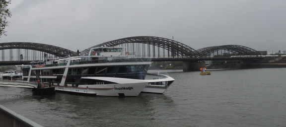 Boat by bridge