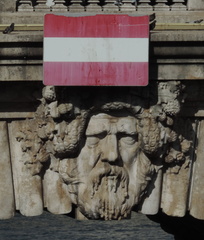 Sign and gargoyle