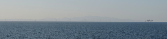 Welsh coast behind wind farm
