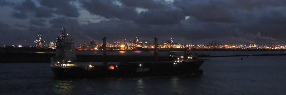 Boat in front of port