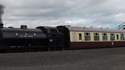 Steam train leaving