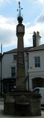 Weathervane, sundial and fountain