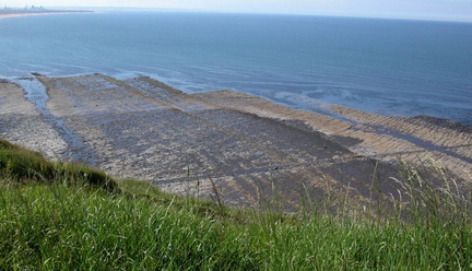 Rocks, sea and works