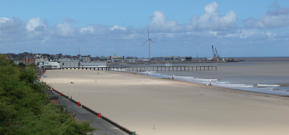 Beach, piers and turbine