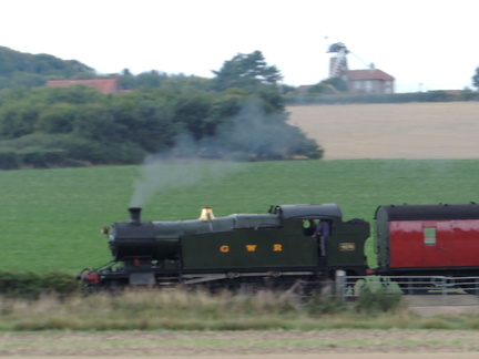 Engine in front of windmill