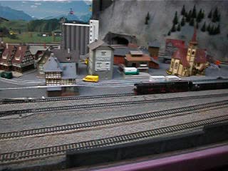 Steam train passing station